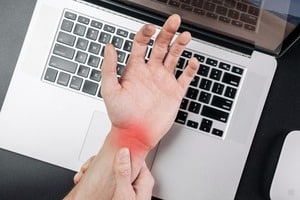 why is carpal tunnel syndrome a repetitive motion injury